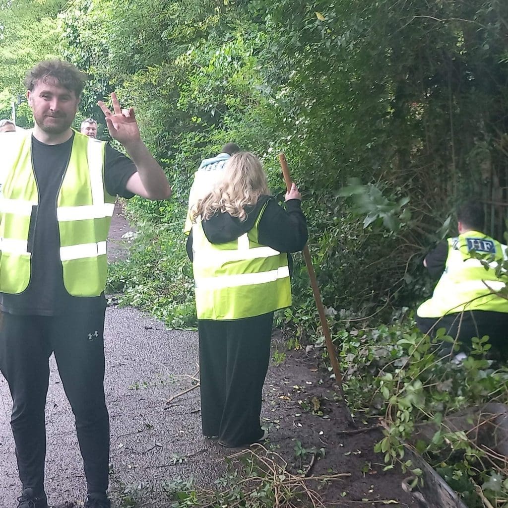 Working hard in the sunshine helping to give back to the local community